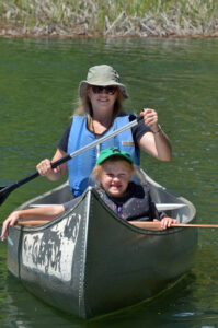 woman and child canoeing