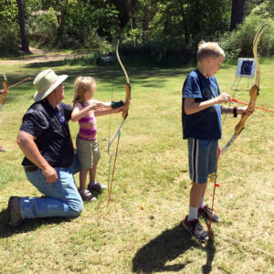 kids learning archery